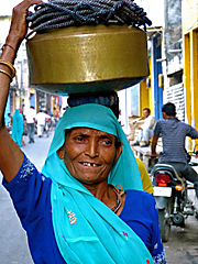 Rajasthani woman with water gagar on head