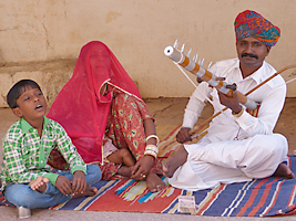 Rajasthani family performing singing and music
